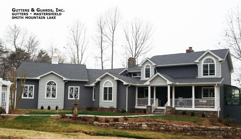 New seamless gutters installed on a lakefront home